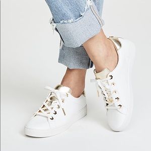 SOLD Michael Kors Tennis Shoes with flower emblems
